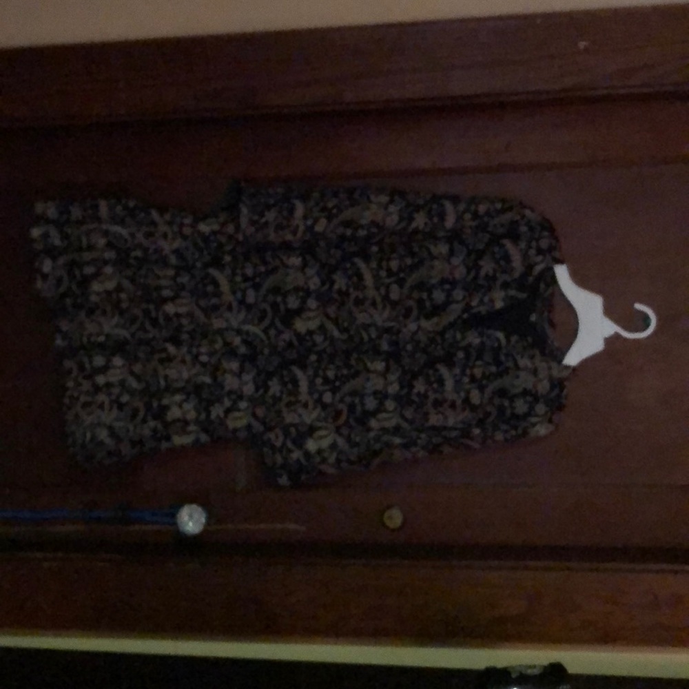 Mid length floral print dress.